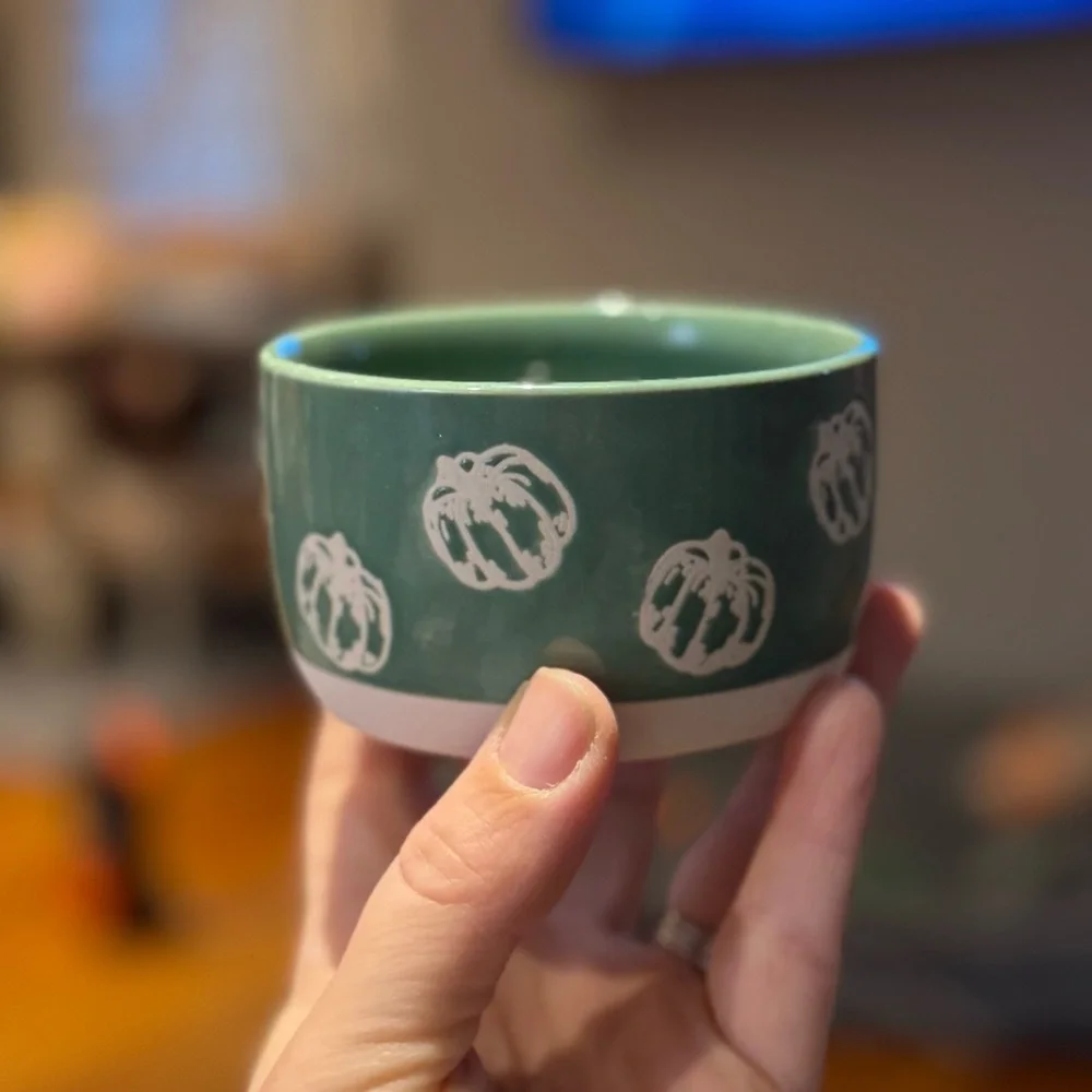 Green Ceramic Bowl with White Pumpkin Design